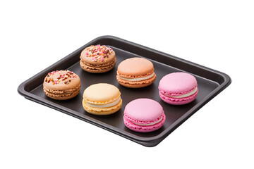 Fototapeta premium Assorted Macarons on Black Tray with Colorful Flavors Isolated on White Background 