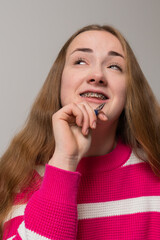 Happy teenager girl smiling on video call during education process