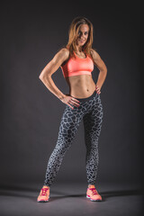 Confident Fitness Woman in Vibrant Gymwear