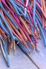Copper electrical installation wires in colored insulation. Close-up. Soft focus.