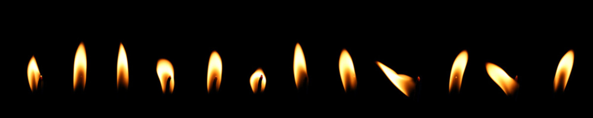 set yellow candle isolated black background, candlelight glow in the dark. concept of decorative Christmas or birthday. candles flame gold