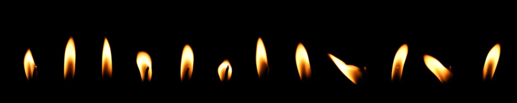 set yellow candle isolated black background, candlelight glow in the dark. concept of decorative Christmas or birthday. candles flame gold