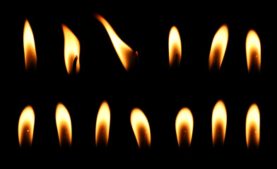 set yellow candle isolated black background, candlelight glow in the dark. concept of decorative...