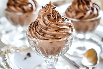 A luxurious mocha mousse with creamy swirls of rich chocolate and light coffee tones, perfect for a dessert-inspired background.