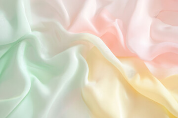 Obraz premium A pastel background of fading gradients blending soft yellow, pale pink, and mint green, creating an ethereal feel.