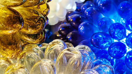 Close up of colorful illuminated glass spheres structure, creative backgrounds