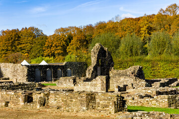 Ruins of Tintern Abbey and spectacular autumn foliage behind