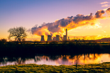 Drax Power in Winter with large plumes of water vapour rising from the cooling towers and...