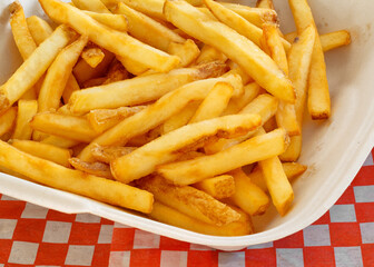 French fries in restaurant serving tray