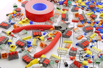 A tool for installing equipment in an electrical switchboard. Soft focus. Close-up.