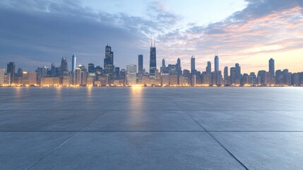 Obraz premium A panoramic view of a city skyline at dawn with a smooth concrete foreground.