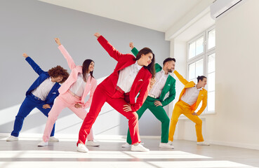 Dancing friends team, group of happy people in vibrant vivid formal suit, cool dance, office party...