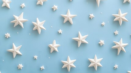 Obraz premium White Stars Arranged on a Light Blue Background