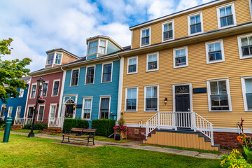 A view down a street of brightly colored buildings in Charlottetown, Prince Edward Island, Canada in the fall