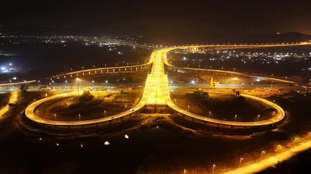 Nighttime vision crisscrossed bridges and streets