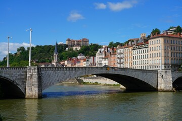 Fototapeta premium View of colorful buildings on the quay on the Saone River in downtown Lyon, France.