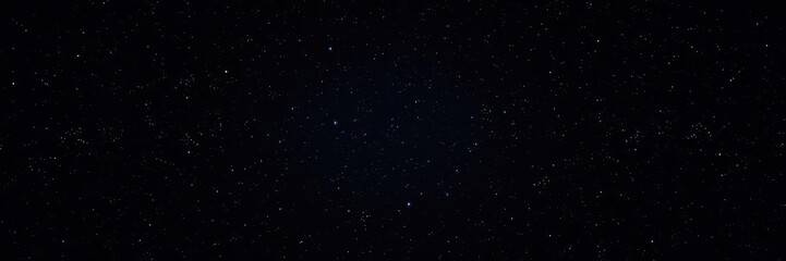 Fototapeta premium Night sky with twinkling stars against a dark background, sparkling, background