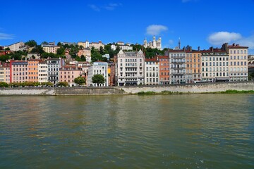 View of colorful buildings on the quay on the Saone River in downtown Lyon, France.