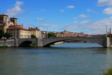 Obraz premium View of colorful buildings on the quay on the Saone River in downtown Lyon, France.