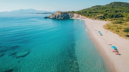 Fototapeta premium An expansive beach with crystal-clear water and an open horizon, a perfect representation of serene summer getaways.