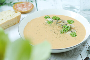 A bowl with mushroom cream soup