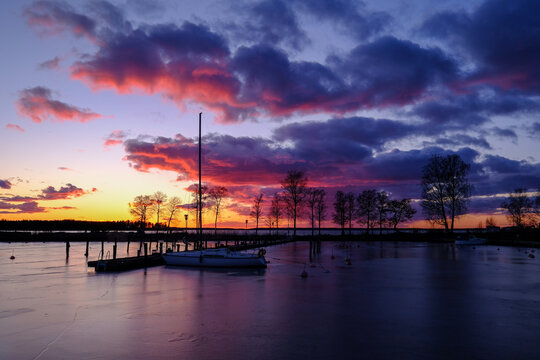 Silhouette of trees along the Gota Canal at sunset, Gotaland, Sweden