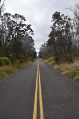 Fototapeta premium Broken roads and split asphalt from the volcanic eruptions and activities around Hawaii Volcanoes National Park on the big island