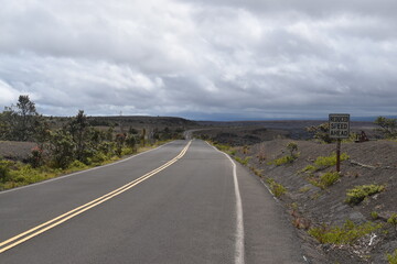 Broken roads and split asphalt from the volcanic eruptions and activities around Hawaii Volcanoes National Park on the big island