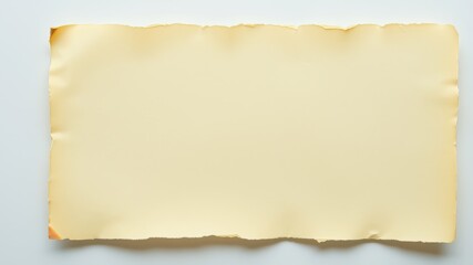 A Blank, Tattered, Pale Yellow Sheet of Paper with Irregular Edges on a White Background