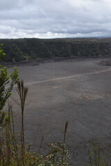 The black coastal landscapes and lava beaches from the active volcanoes on the big island of...