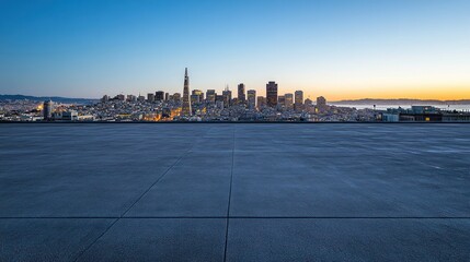 Obraz premium City skyline at sunset with a clear foreground.