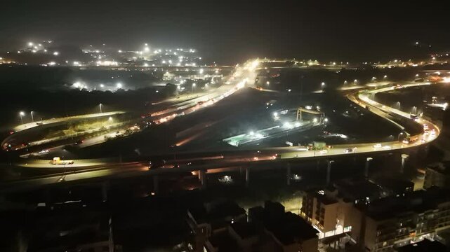 Intricate Web of Highways Glows Vividly in Dark