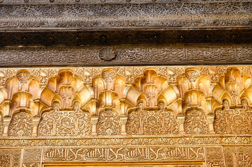 Granada, Spain, Decorative detail atop an indoor wall in the Alhambra Palace