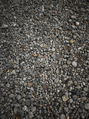 Gravel surface forming textured background in chamonix, france November