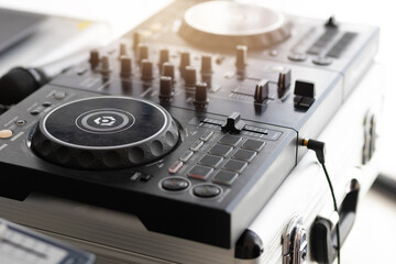 DJ console with records in a club at a party