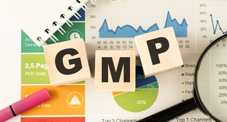GMP - abbreviation of Good Manufacturing Practice concept on cubes