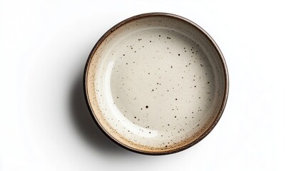 Top view of glazed dinner plate on a white background.