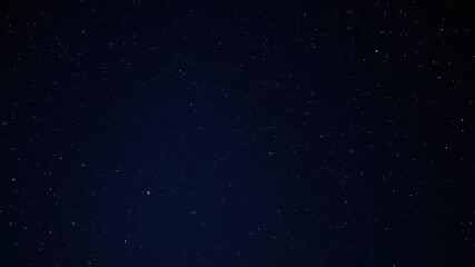 Fototapeta premium Dark night sky filled with sparkling stars against a black background, nature, cosmos