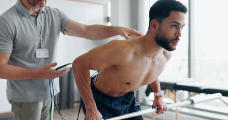 Physiotherapy, training and monitor with man in clinic for biofeedback, muscle stimulation and...