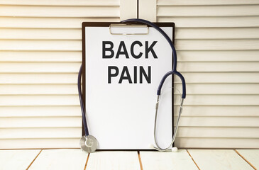 Handwriting text Back Pain. Concept meaning Soreness of the bones felt at the lower back portion of...