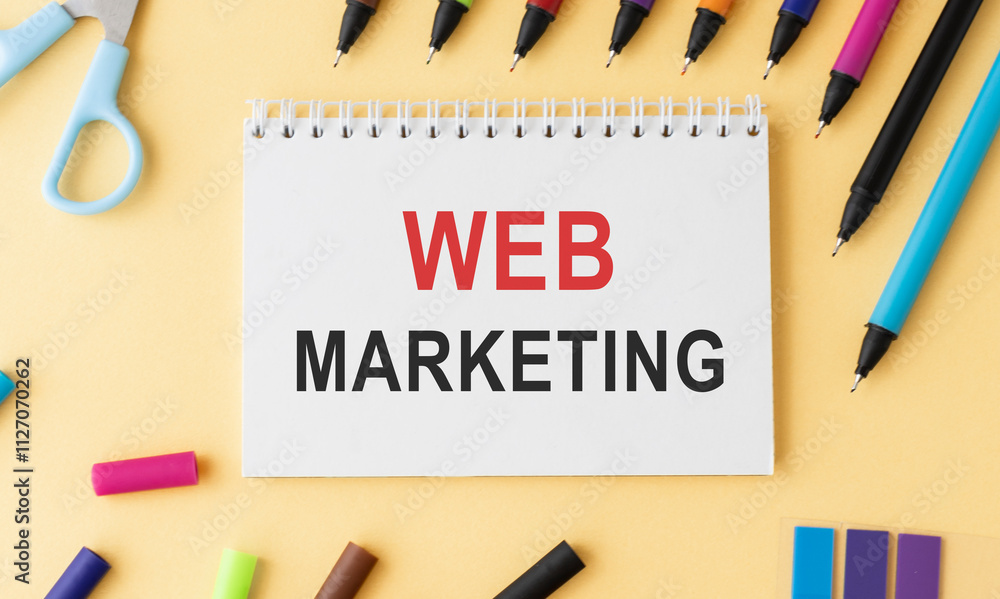 Poster notebook with toolls and notes about web marketing,concept