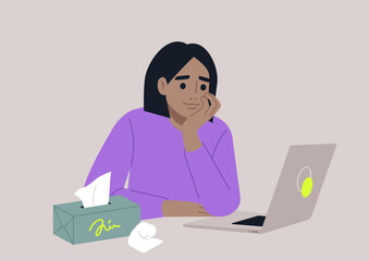 In a comfortable and warm environment, a person reflects on their feelings during an online psychotherapy session, with tissues close by for tears and a laptop open for connection