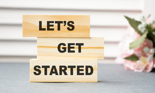 let's get started text on wooden block, business concept