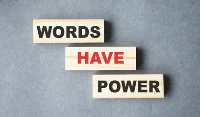 Words Have Power word cube on wood background ,English language learning concept