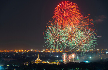 View of colorful fireworks in the middle of the park during the Royal Park Rajapruek IX celebration festival in Thailand