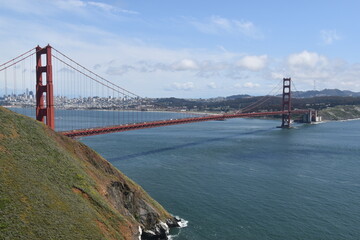 The view over the red Golden Gate Bridge and the San Francisco Skyline in California