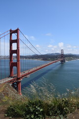 The view over the red Golden Gate Bridge and the San Francisco Skyline in California