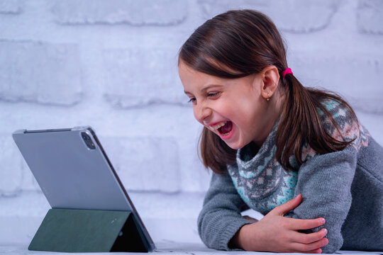 Crown of thorns and rosary beads on brown texture background with space for text