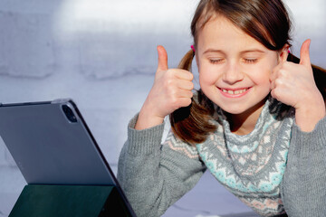 Crown of thorns and rosary beads on brown texture background with space for text