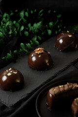 Delicious mousse cakes coated in chocolate glaze